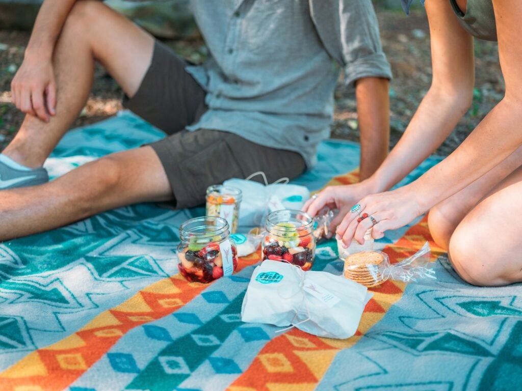 A prepared picnic box with a sandwich, side, and treat from Kimmi’s Tea Room.