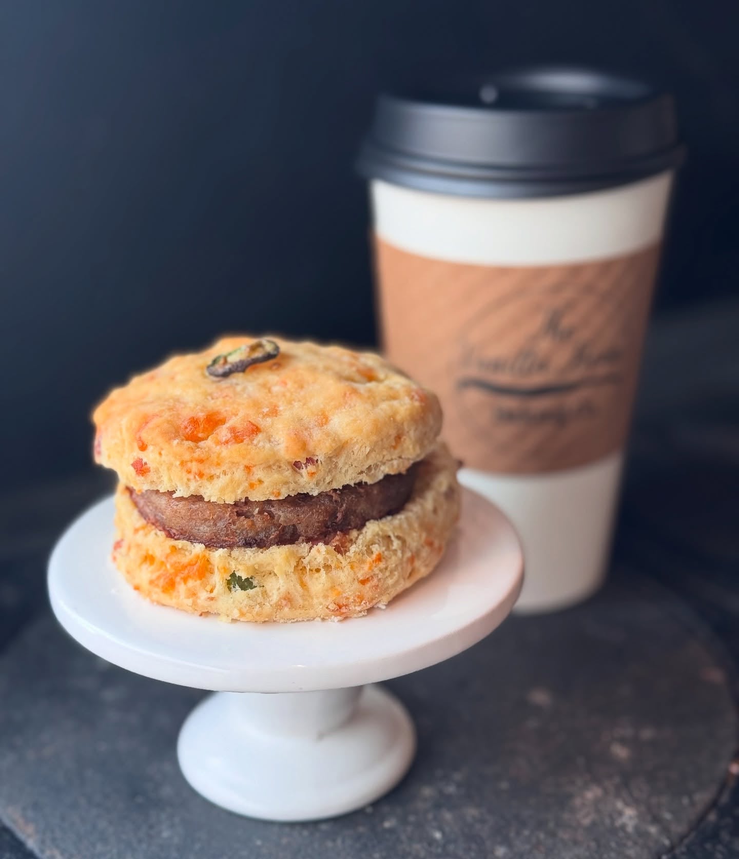 Freshly baked gourmet pastries and coffee on a cafe table at Vanilla Bean Baking Co.